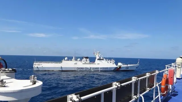 epa11144583 A handout photo made available by the Philippine Coast Guard (PCG) shows China Coast Guard (CCGV-3105) patrol ship maneuvering near Philippine Coast Guard vessel BRP Teresa Magbanua (MRRV-9701) at the vicinity of Scarborough Shoal, Philippines, in the disputed waters of the South China Sea, on 08 February 2024 (issued on 11 February 2024). According to a report from the Philippine Coast Guard (PCG), on 08 February, a China Coast Guard (CCGV-3105) patrol ship conducted a blocking and dangerous maneuver by passing through from port beam to dead ahead of the Philippine Coast Guard BRP Teresa Magbanua (MRRV-9701) vessel. The South China Sea dispute has been ongoing for several years with China, the Philippines, Vietnam, Malaysia, Brunei, and Taiwan, all fighting for sovereignty in the maritime region.  EPA/PHILIPPINE COAST GUARD HANDOUT  HANDOUT EDITORIAL USE ONLY/NO SALES HANDOUT EDITORIAL USE ONLY/NO SALES