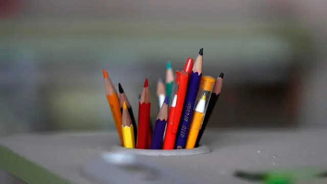 epa10225043 Pencils left at "Rus'ki Tishkovsky Lyceum" school, in the town of Ruski Tyshky, Kharkiv region, Ukraine, 05 October 2022. According to the Ukrainian ministry of education, 2,601 education institutions suffered bombing and shelling - 309 of them have been destroyed completely. Russian troops entered Ukraine on 24 February 2022 starting a conflict that has provoked destruction and a humanitarian crisis  EPA/ATEF SAFADI