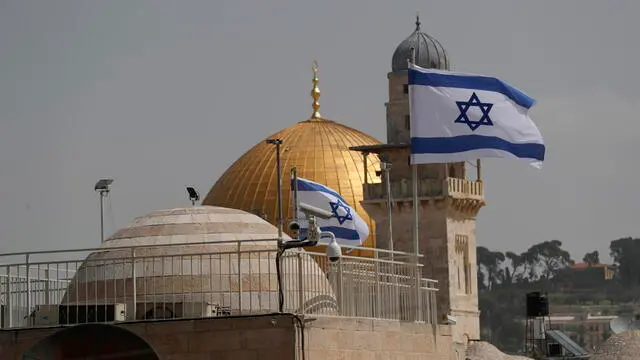 epa10559638 The Dome of the Rock at the Al Aqsa Mosque compound in Jerusalem’s Old City, 05 April 2023. Clashes between Palestinians and Israeli police erupted overnight at the Al Aqsa Mosque when police raided the premises. According to the Israeli police, hundreds of alleged rioters and mosque desecrators who had barricaded themselves at Temple Mount were arrested.  EPA/ATEF SAFADI