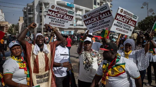 epa11178892 Supporters of Senegalese President Macky Sall take part in a rally themed ‘Macky in our hearts’ in Dakar, Senegal, 24 February 2024. Sall is facing pressure domestically and abroad after failing to set a new date for the presidential election which was originally scheduled for 25 February 2024. Sall, instead, decided to open a ‘social dialogue’ delaying further the presidential election. Sall’s term is scheduled to end on 02 April 2024. EPA/JEROME FAVRE
