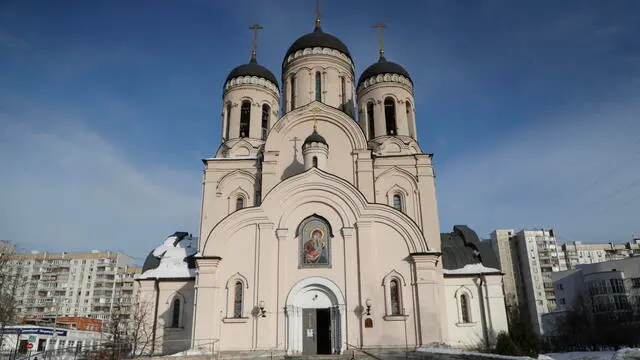 epa11188667 A woman stands outside the Church of the Icon of the Mother of God venue for the upcoming funeral of late Russian opposition leader Alexei Navalny, in Moscow, Russia, 29 February 2024. Navalnyâ€™s funeral will be held at 14:00 local time on 01 March 2024, according to his press-secretary. Outspoken Kremlin critic Navalny died aged 47 in an arctic penal colony on 16 February 2024 after being transferred there in 2023. The colony is considered to be one of the worldâ€™s harshest prisons. EPA/MAXIM SHIPENKOV