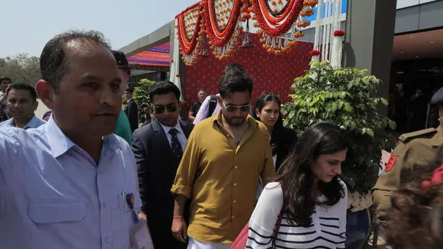 epa11189347 Reliance Industries chairman Mukesh Ambani's son Akash Ambani (C) arrives to receive guests attending Anant Ambani and Radhika Merchant's pre-wedding celebrations, in Jamnagar, India, 29 February 2024. EPA/CHIRAG CHOTALIYA