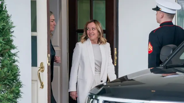 epa11192207 Italian Prime Minister Giorgia Meloni (C) walks out of the West Wing following a meeting with US president at the White House in Washington, DC, USA, 01 March 2024. President Biden seeks to reassure Prime Minister Meloni that the US continues to support Ukraine despite the administration's inability to secure congressional passage of a $60 billion foreign aid package for the embattled country. EPA/SHAWN THEW