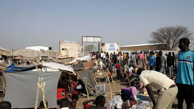 epa10629557 South Sudanese returnees who fled the violence in Sudan, stay at the transit area set up by the UNHCR in the Upper Nile State town of Renk, South Sudan, 15 May 2023. According to the United Nations, some 200,000 people have fled the conflict in Sudan between 15 April and 12 May 2023. Around 40.000 are in South Sudan, and about two million people were internally displaced. Leaving behind them the armed conflict between the Sudanese military and the RSF (Rapid Support Forces) militia which started one month ago today, most of the refugees in South Sudan are South Sudanese returnees, part of the some 800,000 who had previously fled the war in South Sudan and who are now returning to a country which is barely out of conflict itself, with tensions still remaining in many areas. EPA/AMEL PAIN