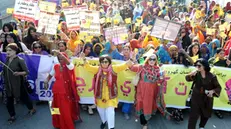 epa11206520 Pakistani women hold placards during a rally to mark International Women's Day in Hyderabad, Pakistan, 08 March 2024. International Women's Day is observed annually on 08 March across the world. The 2024 theme is 'Invest in Women: Accelerate Progress'. EPA/NADEEM KHAWAR