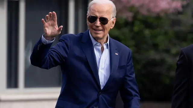 epa11207689 US President Joe Biden waves on the South Lawn of the White House before departing by Marine One en route to Pennsylvania, in Washington, DC, USA, 08 March 2024. President Biden travels to Philadelphia to attend a campaign event the day after delivering his State of the Union address before a joint session of Congress. EPA/MICHAEL REYNOLDS / POOL