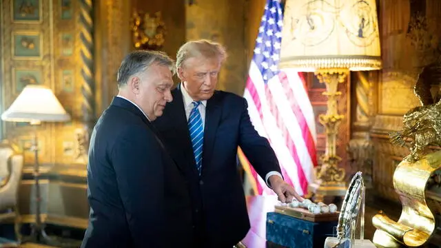 epa11208140 A handout photo made available by the Hungarian Prime Minister's Office shows former US President and Republican presidential candidate Donald Trump (R) talking to Hungarian Prime Minister Viktor Orban during their meeting at Trump's Mar-a-Lago estate in Palm Beach, Florida, USA, 08 March 2024. EPA/Zoltan Fischer / HANDOUT HANDOUT EDITORIAL USE ONLY NO SALES HANDOUT EDITORIAL USE ONLY/NO SALES HANDOUT EDITORIAL USE ONLY/NO SALES