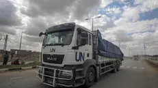 epa11207283 Trucks carrying aid to Gaza residents cross from Rafah border to Deir Al Balah town, southern Gaza Strip, 08 March 2024. Since 07 October 2023, up to 1.9 million people, or more than 85 percent of the population, have been displaced throughout the Gaza Strip, some more than once, according to the United Nations Relief and Works Agency for Palestine Refugees in the Near East (UNRWA), which added that most civilians in Gaza are in 'desperate need of humanitarian assistance and protection'. The international community is combining efforts to increase humanitarian assistance to the residents of Gaza affected by the ongoing conflict. EPA/MOHAMMED SABER