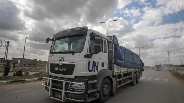 epa11207283 Trucks carrying aid to Gaza residents cross from Rafah border to Deir Al Balah town, southern Gaza Strip, 08 March 2024. Since 07 October 2023, up to 1.9 million people, or more than 85 percent of the population, have been displaced throughout the Gaza Strip, some more than once, according to the United Nations Relief and Works Agency for Palestine Refugees in the Near East (UNRWA), which added that most civilians in Gaza are in 'desperate need of humanitarian assistance and protection'. The international community is combining efforts to increase humanitarian assistance to the residents of Gaza affected by the ongoing conflict. EPA/MOHAMMED SABER