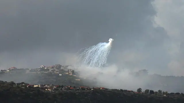 epaselect epa11198500 Smoke rises from the Lebanese village of Markaba as a result of Israeli shelling in southern Lebanon, next to the Israeli moshav of Margaliot at the border with Israel, 04 March 2024. The Israeli military stated on 04 March that following fire crossing from Lebanon into the area of Margaliot in northern Israel a number of civilians were injured and evacuated to receive medical treatment. According to an Israeli army spokesperson, one person was killed, two others were seriously injured and five reported mild to moderate injuries. Israel said it struck the source of the launch in southern Lebanon. EPA/ATEF SAFADI