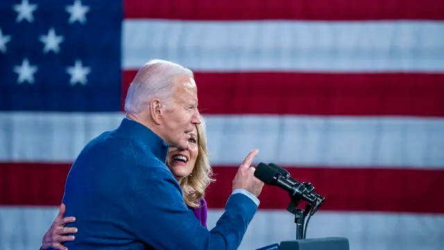 epa11208165 US President Joe Biden (L), with First Lady Jill Biden, concludes his remarks during a campaign rally at Strath Haven Middle School in Wallingford, Pennsylvania, USA, 08 March 2024. President Biden delivered an energetic State of the Union speech on 07 March in hopes of reassuring Democratic voters that he is fit to serve as president another four years. EPA/SHAWN THEW