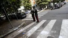 Carabinieri officers investigate a crime scene where a 25-year-old man reacted to a robbery in Teodoro Mommesen street and was shot in the head Wednesday night, sources said Thursday., Rome, Italy, 24 October 2019. The man was reportedly walking along the street with his girlfriend when two men came up behind them, hit the woman in the back of the head with a blunt object and stole her backpack. ANSA/MASSIMO PERCOSSI