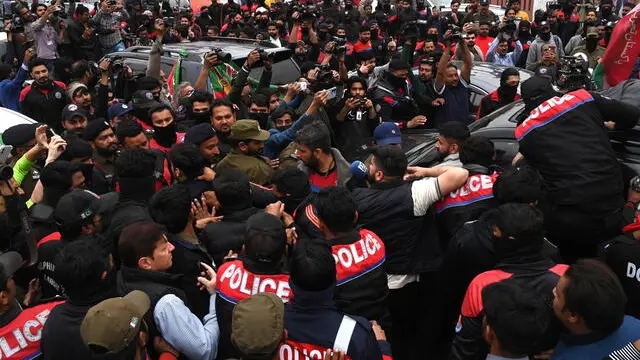 epa11211376 Pakistani police detain supporters of the Pakistan Tehreek-e-Insaf (PTI) party as they gather to protest against alleged rigging in the general elections, in Lahore, Pakistan, 10 March 2024. The PTI party of former Prime Minister Imran Khan continues to protest the election results, alleging rigging, though the Election Commission of Pakistan has dismissed these claims, asserting the fairness of the electoral process. EPA/RAHAT DAR