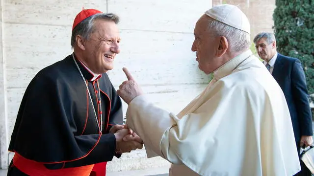 epa09514834 A handout picture provided by the Vatican Media shows Pope Francis (R) greeting Maltese Cardinal Mario Grech, secretary general of the Synod of Bishops, in Vatican City, 09 October 2021. The official inauguration of the diocesan phase of the Synod for all the dioceses around the world will be marked in a solemn Mass in St. Peter's Square on 10 October. EPA/VATICAN MEDIA HANDOUT HANDOUT EDITORIAL USE ONLY/NO SALES