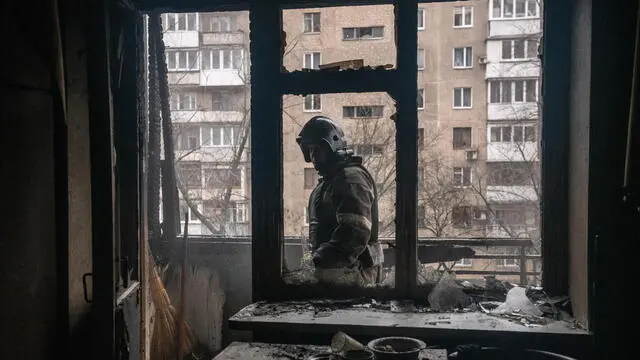 epa11037317 A firefighter works at the site of a damaged building following shelling in Donetsk, Donetsk region, eastern Ukraine, 19 December 2023. Six people were injured in Donetsk as a result of shelling by the Armed Forces of Ukraine (AFU), the mayor of the city Alexey Kulemzin said on 19 December. On 24 February 2022, Russian troops entered Ukrainian territory in what the Russian president declared a 'Special Military Operation', starting an armed conflict that has provoked destruction and a humanitarian crisis. EPA/VALERY MELNIKOV