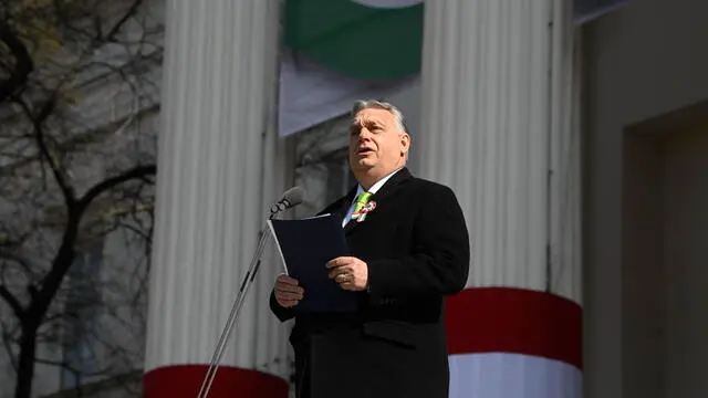 epa11221940 Hungarian Prime Minister Viktor Orban delivers his speech on the steps of the Hungarian National Museum during the official state ceremony to mark the 176th anniversary of the outbreak of the 1848 revolution and war of independence against Habsburg rule in Budapest, Hungary, 15 March 2024. EPA/SZILARD KOSZTICSAK HUNGARY OUT