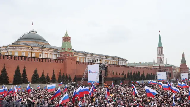 epa11228167 Russian people attend a concert marking the 10th anniversary of 'Crimea's reunification with Russia' at the Red Square in Moscow, Russia, 18 March 2024. In February 2014 Russian forces invaded and seized control of the Crimean Peninsula. Russia declared the annexation of Crimea on 18 March 2014, two days after the celebration of a so called 'referendum' in that territory. In a vote that reaffirmed Ukraine's 'national unity and territorial integrity', the United Nations General Assembly in the Resolution 68/262 condemned the referendum in Crimea stating it had 'no validity'. After the annexation, Moscow escalated its military presence on the peninsula to solidify the new status quo on the ground and since 2015, Russia approved the 'Day of Reunification of Crimea with Russia' as a holiday marked annually on 18 March. EPA/SERGEI ILNITSKY