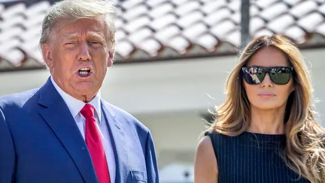 epa10294160 Former US President Donald J. Trump (L) and former First Lady Melania Trump (R), walk out of the electoral precinct after voting in-person at the Morton and Barbara Mandel Recreation Center in Palm Beach, Florida, USA, 08 October 2022. The US midterm elections are held every four years at the midpoint of each presidential term and this year include elections for all 435 seats in the House of Representatives, 35 of the 100 seats in the Senate and 36 of the 50 state governors as well as numerous other local seats and ballot issues. EPA/CRISTOBAL HERRERA-ULASHKEVICH