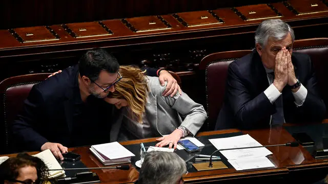 Italian Prime Minister Giorgia Meloni (C) with Italian Minister of Infrastructures, Matteo Salvini (L), and Italian Minister of Foreign Affairs, Antonio Tajani (R), during a session in the Chamber of Deputies, as she reported to the Lower House ahead of the European Council taking place in Brussels on 21 and 22 March, Rome, Italy, 20 Marcxh 2024. ANSA/RICCARDO ANTIMIANI