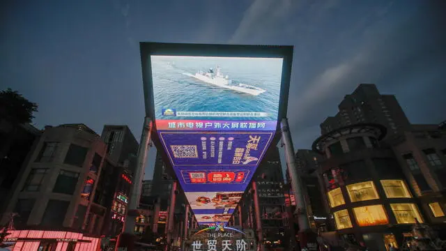 epa10807035 A screen shows evening news on China launching military drills around Taiwan in Beijing, China, 19 August 2023. China is launching military drills around Taiwan on 19 August, in response to the Taiwanâ€™s Vice President William Lai's visit in the United States. EPA/WU HAO