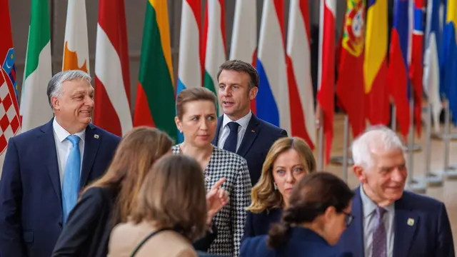 epa11235863 (L-R) Hungary's Prime Minister Viktor Orban, Denmark's Prime Minister Mette Frederiksen, French President Emmanuel Macron, Italian Prime Minister Giorgia Meloni and High Representative for the European Union for Foreign Affairs and Security Policy Josep Borrell arrive with EU leaders to pose for a family picture with their counterparts of the countries in the European Economic Area, Iceland, Norway and Liechtenstein, to mark the 30th anniversary of the European Economic Area (EEA), during the second day of an European Council meeting in Brussels, Belgium, 22 March 2024. EU leaders are meeting in Brussels to discuss continued support for Ukraine, the developing situation in the Middle East, security and defense, enlargement, external relations, migration, agriculture as well as the European semester. EPA/OLIVIER MATTHYS