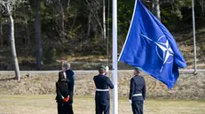 epa11214180 Swedish Minister of Justice Gunnar Strommer and Minister of Climate Romina Pourmokhtari attend a NATO flag-raising ceremony at Musko naval base, outside Stockholm, Sweden, 11 March 2024. Sweden formally joined NATO as the 32nd Ally on 07 March. A flag-raising ceremony to mark Sweden's accession to NATO also took place at NATO Headquarters in Brussels on 11 March. EPA/Fredrik Sandberg/TT SWEDEN OUT