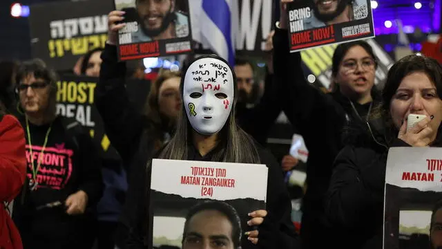 epa11239408 Families and supporters of Israeli hostages held by Hamas in Gaza take part in a protest against Israeli Prime Minister Netanyahu's government and to demand the release of the hostages, outside the Kirya military headquarters in Tel Aviv, Israel, 23 March 2024. According to the Israeli military, 134 Israelis, who were abducted and taken to the Gaza Strip during the 07 October 2023 attacks by Hamas, remain in captivity. Rallies in Israel have been critical of the government as they demand an immediate release of all the hostages. EPA/ATEF SAFADI