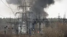 epaselect epa11236701 Smoke rises at the scene of a missile strike on high-voltage lines in the city of Kharkiv, Ukraine, 22 March 2024, amid the Russian invasion. Kharkiv was left without electricity and water supply as a result of a Russian shelling in the morning of 22 March. According to the Air Force Command of the Armed Forces of Ukraine, Russia has launched projectiles against over 151 targets across Ukraine. The Ukrainian army intercepted 92 of them. At least three people were killed across the country with dozens injured. EPA/SERGEY KOZLOV
