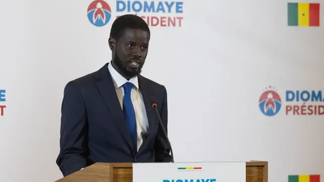 epa11243686 Opposition presidential candidate Bassirou Diomaye Faye speaks during his first press conference after the presidential election in Dakar, Senegal, 25 March 2024. Faye, who was released from prison on 14 March 2024, had a strong lead against the ruling party's presidential Amadou Ba, according to unofficial results. Official results are expected in the coming days. EPA/JEROME FAVRE