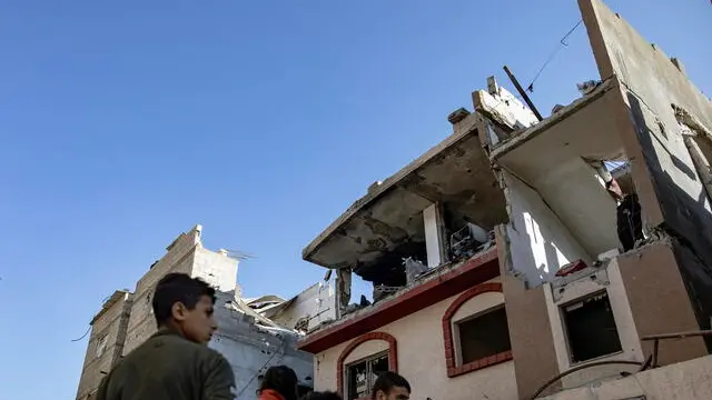 epa11242234 Palestinians, including members of Kurd and Barhoum families, inspect damages of their home after an Israeli airstrike targeted the Rafah refugee camp, southern Gaza Strip, 25 March 2024. More than 32,000 Palestinians and over 1,450 Israelis have been killed, according to the Palestinian Health Ministry and the Israel Defense Forces (IDF), since Hamas militants launched an attack against Israel from the Gaza Strip on 07 October 2023, and the Israeli operations in Gaza and the West Bank which followed it. EPA/HAITHAM IMAD