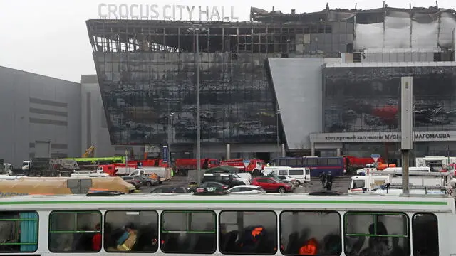 epa11241011 A view on the Crocus City Hall concert venue following a terrorist attack in Krasnogorsk, outside Moscow, Russia, 24 March 2024. Russia observes a day of national mourning for the victims of the terrorist attack in Crocus City Hall in Krasnogorsk. On 22 March, a group of gunmen attacked the Crocus City Hall in the Moscow region, Russian emergency services said. According to the latest data from the Russian Investigative Committee, 152 people died and more than 100 were hospitalized. On the morning of 23 March, the director of the Russian FSB, Alexander Bortnikov, reported to Russian President Vladimir Putin about the detention of 11 people, including all four terrorists directly involved in the terrorist attack. EPA/MAXIM SHIPENKOV