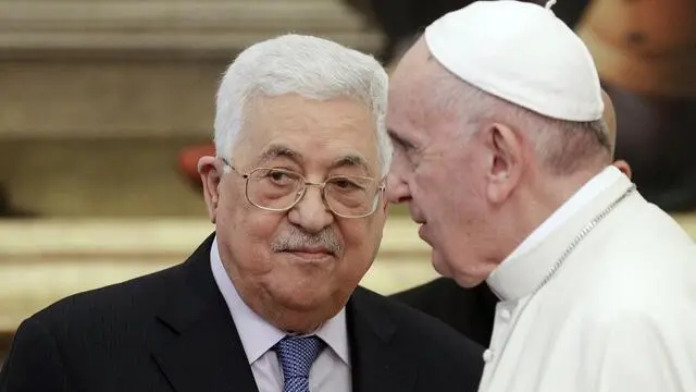 epa07205768 Pope Francis (R) talks with President of the Palestinian National Authority Mahmoud Abbas (L) during a private audience at the Vatican, 03 December 2018. EPA/ANDREW MEDICHINI / POOL
