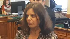 Ilaria Salis, the 39-year-old Milanese teacher who has been in prison for 13 months after the court rejected the request to go under house arrest in Hungary at the courtroom in Budapest, Hungary, 28 March 2024. Italian teacher Ilaria Salis was again handcuffed at her wrists, with shackles on her ankles, and led in on a chain like a leash by a police officer as she entered a Budapest courtroom on Thursday, the same as happened in a hearing on January 29. ANSA/Enrico Martinelli +++BEST QUALITY AVAILABLE+++