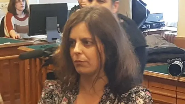 Ilaria Salis, the 39-year-old Milanese teacher who has been in prison for 13 months after the court rejected the request to go under house arrest in Hungary at the courtroom in Budapest, Hungary, 28 March 2024. Italian teacher Ilaria Salis was again handcuffed at her wrists, with shackles on her ankles, and led in on a chain like a leash by a police officer as she entered a Budapest courtroom on Thursday, the same as happened in a hearing on January 29. ANSA/Enrico Martinelli +++BEST QUALITY AVAILABLE+++