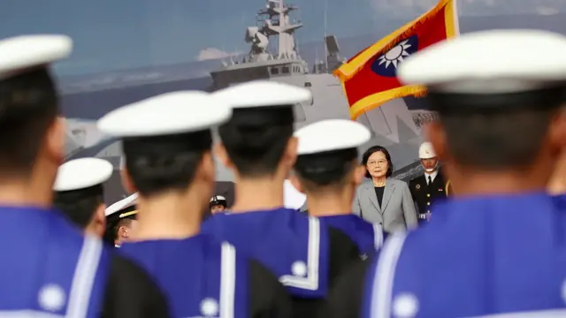 epa11243886 Taiwanese President Tsai Ing-wen reacts during the Handover Ceremony of the An Chiang (PGG-625) and Wan Chiang (PGG-626) corvettes for the Taiwanese Navy in Suao harbor, in Yilan, Taiwan, 26 March 2024. Taiwan's Navy has taken possession of its fifth and sixth Tuo Chiang-class corvettes, which were built within the country. The An Chiang and Wan Chiang corvettes, crafted by Lungteh Shipbuilding Co., are part of a class of fast, stealth-capable, multi-functional corvettes, specifically designed and manufactured for the Republic of China (Taiwan) Navy. EPA/RITCHIE B. TONGO