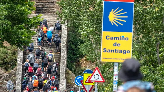 epa10758016 A group of pilgrims are entering the City of Portomarin in Galicia, Spain, 09 June 2023. Every pilgrim has to collect at least two stamps per day from churches, town halls, or other official establishments on its way to Santiago in they Credential of the Pilgrim. The St James Way, also known as the â€˜Way of Saint Jamesâ€™ is one of the most ancient and popular pilgrimage routes in the world since the XI century. Often referred to as the Camino de Santiago, this Way takes pilgrims through many different routes across Spain, France and Portugal and culminates in the city of Santiago de Compostela. EPA/CRISTOBAL HERRERA-ULASHKEVICH ATTENTION: This Image is part of a PHOTO SET