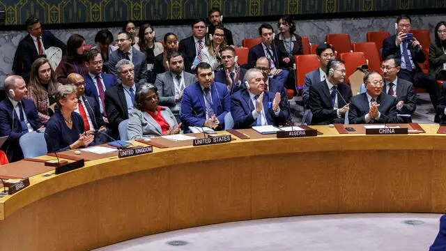 epa11242912 Ambassadors clap after they passed a resolution calling for an immediate ceasefire in Gaza, during a United Nations Security Council meeting at the United Nations Headquarters in New York, USA, 25 March 2024. The resolution passed with 14 members voting in favor while the US absteined from the vote. EPA/SARAH YENESEL