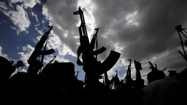 epa11250136 Houthi supporters hold up weapons during a protest against the US and Israel, and in solidarity with the Palestinians, in Sana'a, Yemen, 29 March 2024. Houthi supporters participated in a protest against the United States and Israel and to show their solidarity with the Palestinians of Gaza amid the ongoing conflict between Israel and Hamas. The protest came just a day after the Houthis' top leader, Abdul-Malik al-Houthi, vowed to keep up missile and drone attacks against shipping lanes in the Red Sea and the Gulf of Aden in support of the Palestinians in Gaza. In light of increased maritime security threats, the US has designated the Houthis as a 'Specially Designated Global Terrorist Group'. EPA/YAHYA ARHAB