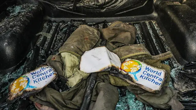 epa11255093 Clothes of members of the NGO World Central Kitchen (WCK) are seen inside their destroyed car along Al Rashid road, between Deir Al Balah and Khan Younis in the southern Gaza Strip, 02 April 2024. According to the Palestinian Red Crescent, at least four people from the NGO World Central Kitchen (WCK) were killed when a missile hit their convoy in Deir al Balah while they were on their way from Rafah to Gaza City to receive fresh aid delivered by the Open Arms vessel. The victims were confirmed to be a British, a Polish and an Australian citizen, while the nationality of the fourth victim was still unknown. EPA/MOHAMMED SABER EPA-EFE/MOHAMMED SABER