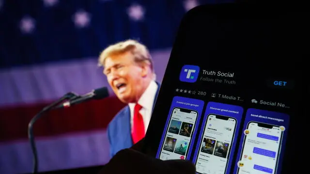 epa11255983 A photo illustration of social media platform Truth Social shown on a mobile phone and former US President Donald Trump (L) in Washington, DC, USA, 02 April 2024. Stock in the parent company, Trump Media and Technology Group, fell sharply in the last 48 hrs after the organisation reported loses of $58 million last year. EPA/WILL OLIVER