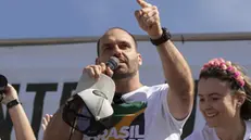 epa10062072 Eduardo Bolsonaro, son of Brazilian President, delivers a speech during a demonstration in favor of the use of weapons, in Brasilia, Brazil, 09 July 2022. Since his arrival at the Brazilian Presidency, Jair Bolsonaro has taken measures to make the sale and carrying of weapons more flexible. EPA/JOEDSON ALVES