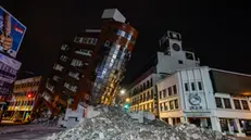 epa11257865 A partially collapsed residential building following the 03 April magnitude 7.4 earthquake in Hualien, Taiwan, 04 April 2024. According to data released by Taiwan's National Fire Agency, the earthquake has taken at least nine lives and injured hundreds, making it the strongest earthquake in 25 years. EPA/DANIEL CENG