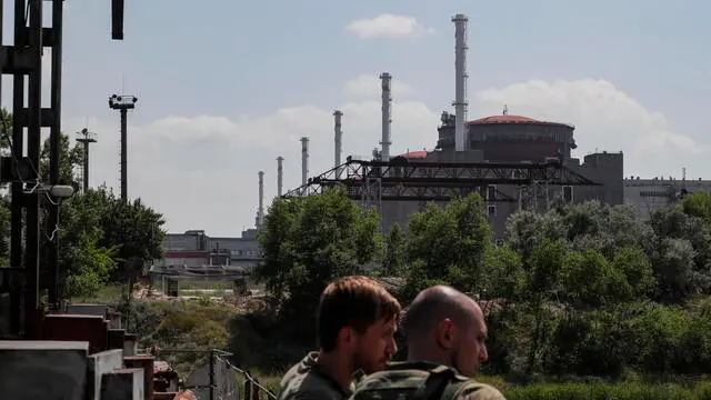 epa10693169 A picture taken during a visit to Enerhodar organised by the Russian Defence ministry shows a general view of the Zaporizhzhia Nuclear Power Plant in Enerhodar, southeastern Ukraine, 15 June 2023. The Zaporizhzhia Nuclear Power Plant can still continue to draw water from the Kakhovka reservoir, the IAEA reports. Grossi said that after the destruction of the Kakhovka hydroelectric power station, a situation may arise when the water from the Kakhovka reservoir will not be enough to cool the reactors of the Zaporozhye nuclear power plant. According to him, in this case, the reactors can be damaged, which threatens with the onset of radiological consequences. The water level in the reservoir near the Zaporizhzhya TPP has dropped to 11.27 meters and continues to decline. EPA/SERGEI ILNITSKY