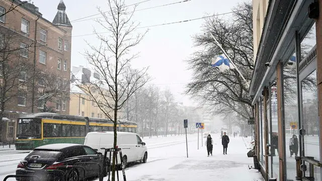 epa11256482 A flag flies at half-mast during a day of mourning after a school shooting in Helsinki, Finland, 03 April 2024. According to police, one 12-year-old child died, and two others were injured in a shooting incident in a school in Vantaa on 02 April. The suspect, also aged 12, fled the scene but was later arrested. EPA/KIMMO BRANDT