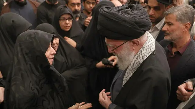 epa11259192 A handout photo made available by the Iranian supreme leader office shows Iranian Supreme Leader Ayatollah Ali Khamenei (R) talking with families and relatives of the Iranian revolutionary guards corps (IRGC) who were killed in Syria, ahead of their funeral in Tehran, Iran, 04 April 2024. According to Iranian state media quoting the Islamic Revolutionary Guard Corps, at least seven IRGC military advisors, including two generals, were killed in an airstrike on the Iranian consulate building in Syria's capital Damascus on 01 April. Iran has blamed Israel for the attack and vowed to respond. Iranians will hold a funeral ceremony for them on 05 April 2024. EPA/IRANIAN SUPREME LEADER OFFICE / HANDOUT HANDOUT EDITORIAL USE ONLY/NO SALES HANDOUT EDITORIAL USE ONLY/NO SALES