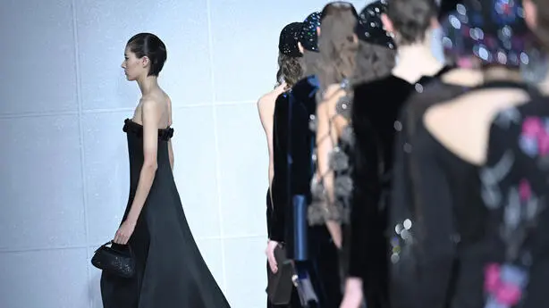 A model wears a creation part of the Giorgio Armani women's Fall-Winter 2024-25 collection presented at the MIlan's Fashion Week in Milan,in Milan, Italy, 25 February 2024 at the MIlan's Fashion Week in Milan, Italy, 23 February 2024. The women's Fall-Winter 2024-25 collection runs from 20 t0 26 February. ANSA/DANIEL DAL ZENNARO