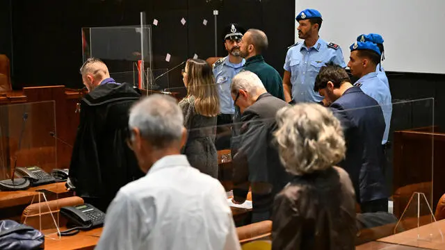 Alberto Scagni (G) durante la lettura della sentenza di condanna a 24 anni e 6 mesi oltre a 3 anni di Rems, durante l'udienza della sentenza del Tribunale. Genova, 29 settembre 2023. ANSA/LUCA ZENNARO