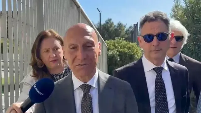 Arresti Bari: interrogatorio di garanzia per l'ex sindaco di Triggiano Antonio Donatelli (a destra accompagnato dal suo avvocato Modesti a sinistra )