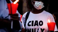 Un momento della fiaccolata in piazza Sempione “Con Willy” in ricordo di Willy Monteiro Duarte, il giovane ucciso nella notte tra il 5 e il 6 settembre a Colleferro, Roma, 16 settembre 2020. ANSA/ANGELO CARCONI