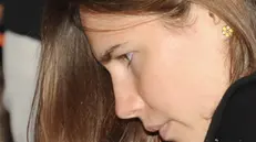 Amanda Knox durante il processo d'appello per l'omicidio di Meredith Kercher, in una immagine del 03 ottobre 2011. ANSA/PIETRO CROCCHIONI